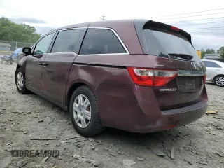 2011 Honda Odyssey LX z VIN 5FNRL5H29BB057920, wystawiony jako Copart lot #56433905 z przebiegiem 143 551 mil mil oraz Szkoda całkowita • Salvage title. Historia ofert i sprzedaży dostępna na DreamBid. Obrazek 2.