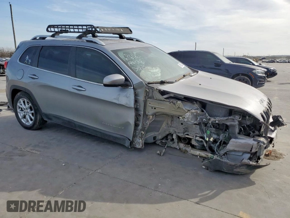 2015 Jeep Cherokee Latitude with VIN 1C4PJLCB4FW539933, listed as a Copart auction lot 49558245 with 142,828 mi miles and Salvage Title. Bid and sale history available at carsss.com. Image 4.
