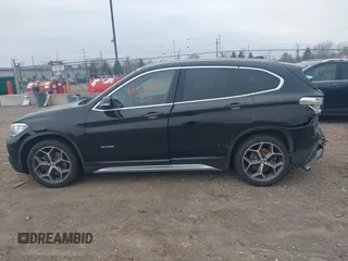 2016 BMW X1 xDrive28i with VIN WBXHT3C37G5E48434, listed as a IAAI auction lot 42005591 with 140,066 mi miles and . Bid and sale history available at DreamBid. Image 14.