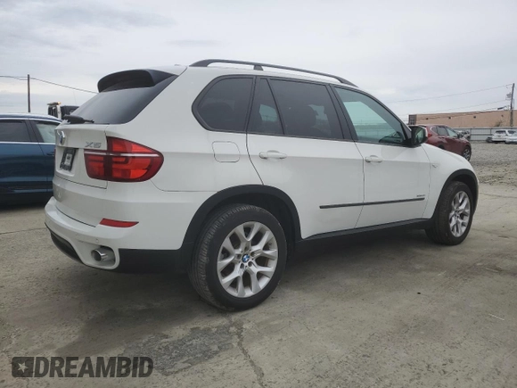 2011 BMW X5 35i z VIN 5UXZV4C54BL402434, wystawiony jako Copart lot #52797515 z przebiegiem 181 109 mil mil oraz Czysty tytuł • Clean title. Historia ofert i sprzedaży dostępna na DreamBid. Obrazek 3.