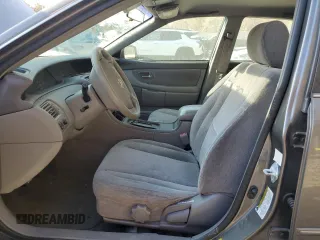 2004 Toyota Avalon XL z VIN 4T1BF28B74U351295, wystawiony jako Copart lot #78364424 z przebiegiem 129 130 mil mil oraz Szkoda całkowita • Salvage title. Historia ofert i sprzedaży dostępna na DreamBid. Obrazek 7.