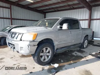 2011 Nissan Titan SL with VIN 1N6AA0EC7BN306488, listed as a IAAI auction lot 41413618 with 102,465 mi miles. Bid and sale history available at carsss.com. Image 2.