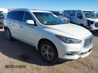 2016 Infiniti QX60 with VIN 5N1AL0MM0GC524603, listed as a IAAI auction lot 41237944 with 133,296 mi miles. Bid and sale history available at carsss.com. Image 1.