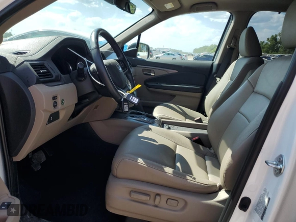 2021 Honda Pilot EX-L with VIN 5FNYF6H58MB084287, listed as a Copart auction lot 59658784 with 32,707 mi miles and Salvage title. Bid and sale history available at DreamBid. Image 7.