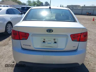 2010 Kia Forte EX with VIN KNAFU4A2XA5097831, listed as a IAAI auction lot 41872156 with 168,081 mi miles. Bid and sale history available at carsss.com. Image 16.