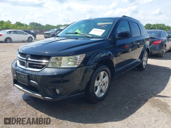 2012 Dodge Journey SXT with VIN 3C4PDCBG0CT352887, listed as a IAAI auction lot 42618786 with 201,008 mi miles and . Bid and sale history available at DreamBid. Image 2.