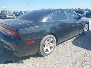 2014 Dodge Charger Police with VIN 2C3CDXAT9EH261962, listed as a IAAI auction lot 42183216 with 166,916 mi miles and . Bid and sale history available at carsss.com. Image 4.