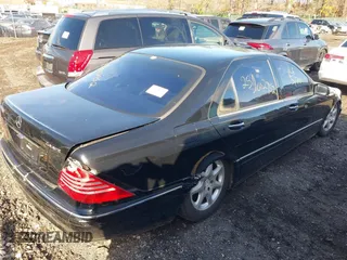 2004 Mercedes-Benz S-Class 5.0L with VIN WDBNG84J44A427425, listed as a IAAI auction lot 41851176 with 999,999 mi miles. Bid and sale history available at carsss.com. Image 4.
