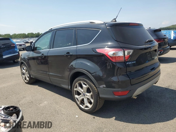 2018 Ford Escape Titanium with VIN 1FMCU9J97JUB94406, listed as a Copart auction lot 66663215 with 96,482 mi miles and Salvage title. Bid and sale history available at DreamBid. Image 2.