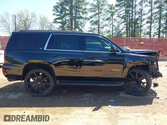 2020 Chevrolet Tahoe LT with VIN 1GNSKBKC7LR159742, listed as a IAAI auction lot 41854694 with 112,087 mi miles and . Bid and sale history available at DreamBid. Image 14.