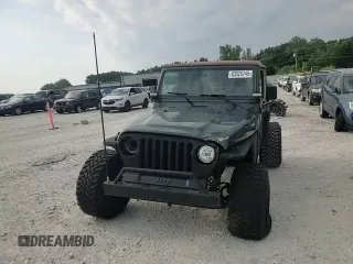 2002 Jeep Wrangler Sahara with VIN 1J4FA59S02P729015, listed as a Copart auction lot 63525745 with Not provided miles and Clean title. Bid and sale history available at DreamBid. Image 13.
