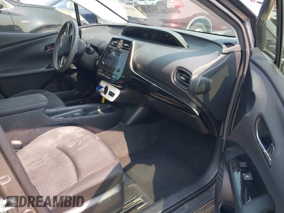 2016 Toyota Prius Four z VIN JTDKARFU1G3027589, wystawiony jako IAAI lot #42391692 z przebiegiem 172 255 mil mil oraz . Historia ofert i sprzedaży dostępna na DreamBid. Obrazek 5.