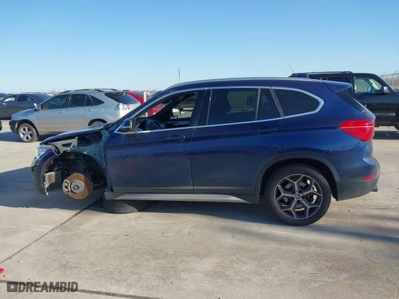 2019 BMW X1 sDrive28i with VIN WBXHU7C54K5L11298, listed as a IAAI auction lot 41662155 with 36,753 mi miles. Bid and sale history available at carsss.com. Image 14.