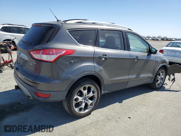 2015 Ford Escape Titanium with VIN 1FMCU9J99FUC13108, listed as a Copart auction lot 60815265 with 70,938 mi miles and Salvage title. Bid and sale history available at DreamBid. Image 3.