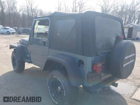 1997 Jeep Wrangler SE with VIN 1J4FY29P0VP522005, listed as a IAAI auction lot 41895863 with 196,614 mi miles. Bid and sale history available at carsss.com. Image 3.