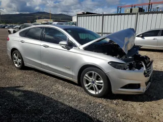2016 Ford Fusion Titanium with VIN 3FA6P0SU1GR316318, listed as a Copart auction lot 56244015 with 73,451 mi miles and Salvage title. Bid and sale history available at DreamBid. Image 4.