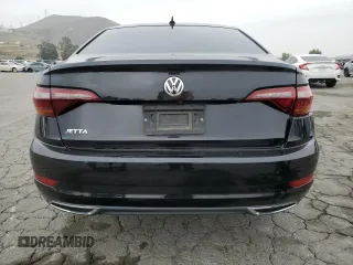 2019 Volkswagen Jetta S с VIN 3VWC57BU5KM063325, выставлен на аукционе Copart как лот 57286335 с пробегом 89 394 миль миль и Списание • Salvage title. История ставок и продаж доступна на DreamBid. Изображение 6.