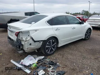 2017 Nissan Altima SR with VIN 1N4AL3AP4HN326560, listed as a IAAI auction lot 41349728 with 153,960 mi miles and . Bid and sale history available at carsss.com. Image 4.