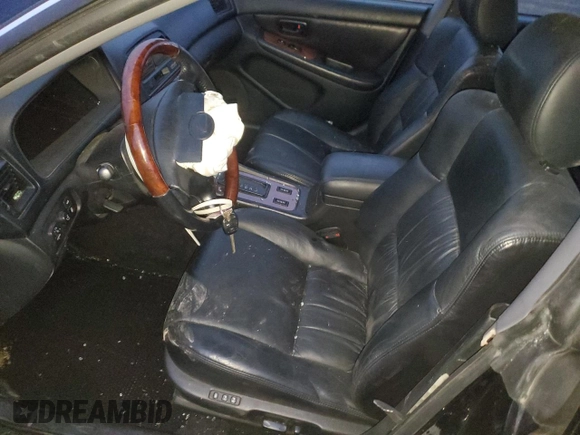 2001 Lexus ES 300 with VIN JT8BF28G010338826, listed as a Copart auction lot 87379074 with Not Provided miles and Salvage Title. Bid and sale history available at DreamBid. Image 7.