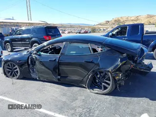 2022 Tesla Model S with VIN 5YJSA1E52NF476906, listed as a IAAI auction lot 41320074 with Not Provided miles and . Bid and sale history available at DreamBid. Image 13.