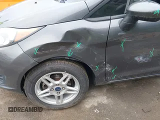 2019 Ford Fiesta SE z VIN 3FADP4BJ7KM155094, wystawiony jako IAAI lot #42186126 z przebiegiem 93 684 mil mil oraz . Historia ofert i sprzedaży dostępna na DreamBid. Obrazek 6.