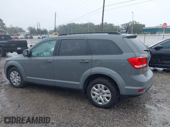 2019 Dodge Journey SE with VIN 3C4PDCBB2KT804440, listed as a IAAI auction lot 41333876 with 72,209 mi miles and . Bid and sale history available at DreamBid. Image 14.