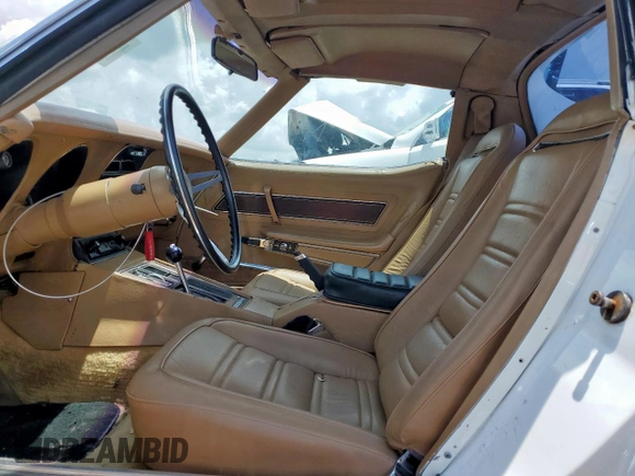 1974 Chevrolet Corvette with VIN 1Z37J4S419559, listed as a Copart auction lot 61386825 with 29,975 mi miles and Salvage title. Bid and sale history available at DreamBid. Image 7.