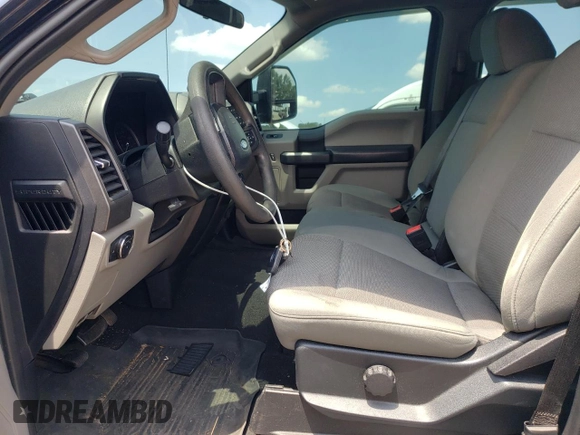 2020 Ford F-250 XL with VIN 1FT8W2BTXLEE30615, listed as a Copart auction lot 60626295 with 142,318 mi miles and Salvage title. Bid and sale history available at DreamBid. Image 7.