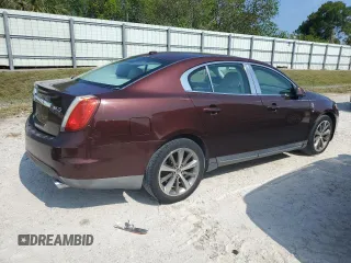 2009 Lincoln MKS with VIN 1LNHM93R19G631250, listed as a Copart auction lot 55442505 with 160,926 mi miles and Salvage Title. Bid and sale history available at DreamBid. Image 3.