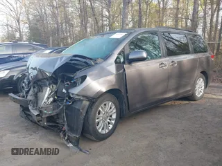 2011 Toyota Sienna XLE AAS with VIN 5TDYK3DC2BS093980, listed as a IAAI auction lot 42064568 with 196,893 mi miles. Bid and sale history available at carsss.com. Image 17.