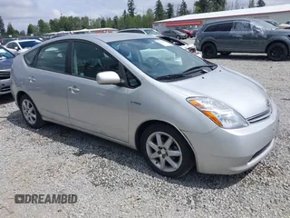 2007 Toyota Prius z VIN JTDKB20U077655326, wystawiony jako IAAI lot #42256711 z przebiegiem 82 232 mil mil oraz . Historia ofert i sprzedaży dostępna na DreamBid. Obrazek 1.