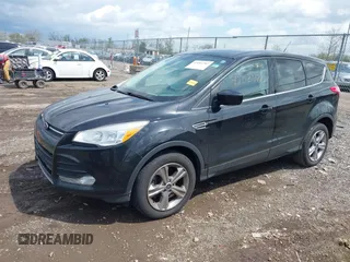 2013 Ford Escape SE with VIN 1FMCU0GX1DUA99040, listed as a IAAI auction lot 42084787 with 140,473 mi miles and . Bid and sale history available at DreamBid. Image 2.