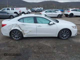 2019 Acura TLX z VIN 19UUB3F33KA007148, wystawiony jako IAAI lot #41889013 z przebiegiem 97 654 mil mil oraz . Historia ofert i sprzedaży dostępna na DreamBid. Obrazek 13.
