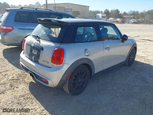 2014 MINI Cooper Hardtop S with VIN WMWXM7C55ET969444, listed as a IAAI auction lot 41448582 with NaN miles. Bid and sale history available at carsss.com. Image 4.