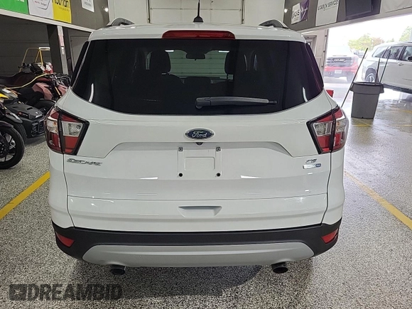 2018 Ford Escape SE z VIN 1FMCU9GD4JUA76194, wystawiony jako IAAI lot #42421138 z przebiegiem 47 896 mil mil oraz . Historia ofert i sprzedaży dostępna na DreamBid. Obrazek 14.