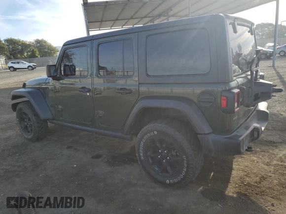 2021 Jeep Wrangler Unlimited Willys with VIN 1C4HJXDM0MW655574, listed as a Copart auction lot 82288524 with 34,986 mi miles and Salvage title. Bid and sale history available at DreamBid. Image 2.