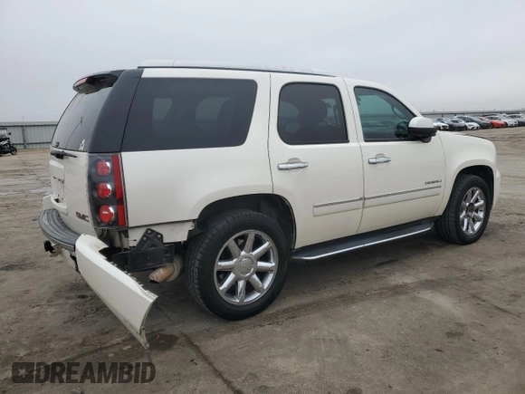 2012 GMC Yukon Denali with VIN 1GKS1EEF9CR286600, listed as a Copart auction lot 44409805 with 140,156 mi miles and Salvage Title. Bid and sale history available at carsss.com. Image 3.