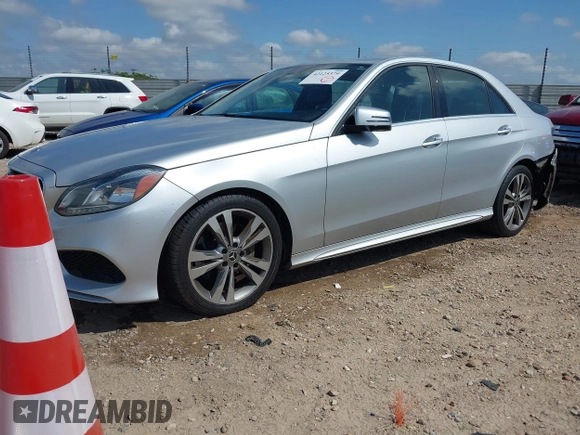 2014 Mercedes-Benz E 350 Sport with VIN WDDHF5KB4EA973595, listed as a IAAI auction lot 42125379 with 162,320 mi miles and . Bid and sale history available at DreamBid. Image 2.