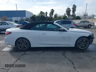 2022 BMW 4 Series M440i with VIN WBA53AT02NCJ20674, listed as a IAAI auction lot 41200398 with 28,235 mi miles and . Bid and sale history available at DreamBid. Image 14.