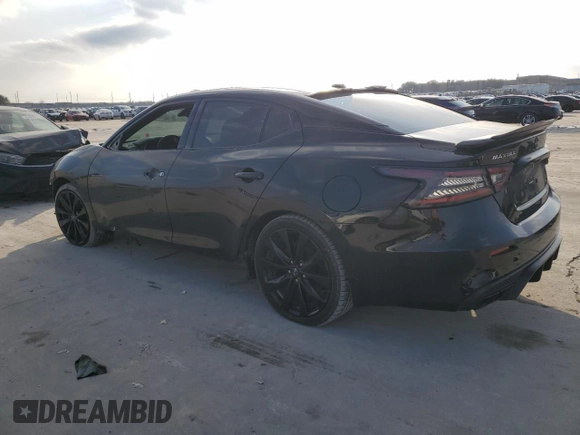 2020 Nissan Maxima SR with VIN 1N4AA6EVXLC366646, listed as a Copart auction lot 44740745 with 104,100 mi miles and Salvage Title. Bid and sale history available at DreamBid. Image 2.