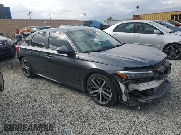 2024 Honda Civic Touring z VIN 2HGFE1F98RH336464, wystawiony jako Copart lot #50504775 z przebiegiem 14 655 mil mil oraz Szkoda całkowita • Salvage title. Historia ofert i sprzedaży dostępna na DreamBid. Obrazek 4.