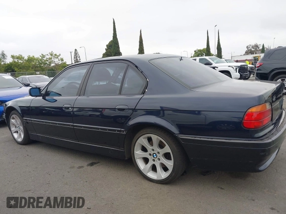 1998 BMW 7 Series with VIN WBAGF8323WDL57406, listed as a IAAI auction lot 42428227 with 93,448 mi miles and . Bid and sale history available at DreamBid. Image 13.