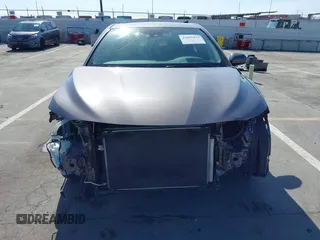 2019 Toyota Camry LE with VIN 4T1B11HK2KU240465, listed as a IAAI auction lot 42095075 with 67,852 mi miles and . Bid and sale history available at DreamBid. Image 13.