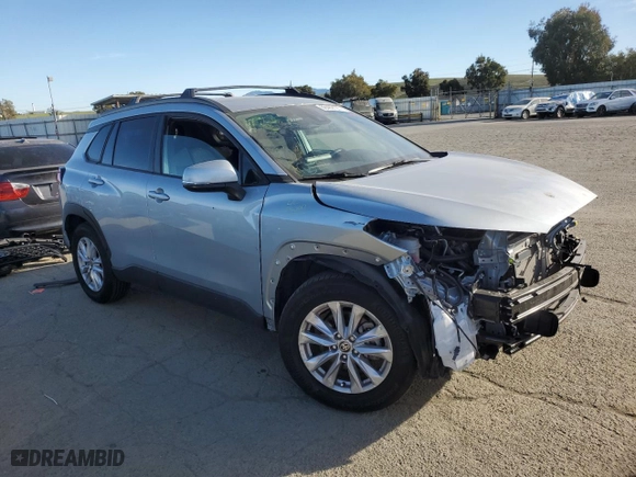 2022 Toyota Corolla Cross LE with VIN 7MUCAABG9NV042753, listed as a Copart auction lot 88469125 with 23,760 mi miles and Salvage Title. Bid and sale history available at carsss.com. Image 4.
