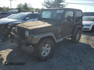 2001 Jeep Wrangler Sport with VIN 1J4FA49SX1P318889, listed as a Copart auction lot 67213064 with 157,444 mi miles and Clean Title. Bid and sale history available at carsss.com. Image 1.
