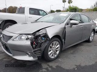 2015 Lexus ES 300h with VIN JTHBW1GG6F2093327, listed as a IAAI auction lot 42107023 with 102,502 mi miles and . Bid and sale history available at DreamBid. Image 2.