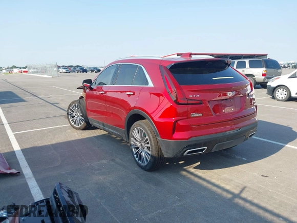 2025 Cadillac XT4 AWD Premium Luxury with VIN 1GYFZDR42SF118428, listed as a IAAI auction lot 42376074 with 13,758 mi miles and . Bid and sale history available at DreamBid. Image 3.
