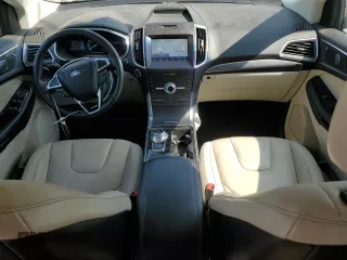 2020 Ford Edge Titanium с VIN 2FMPK4K99LBB03007, выставлен на аукционе Copart как лот 60809735 с пробегом 40 127 миль миль и Списание • Salvage title. История ставок и продаж доступна на DreamBid. Изображение 8.