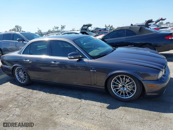2008 Jaguar XJ with VIN SAJWA71B68SH22853, listed as a IAAI auction lot 41678688 with 76,367 mi miles. Bid and sale history available at carsss.com. Image 13.