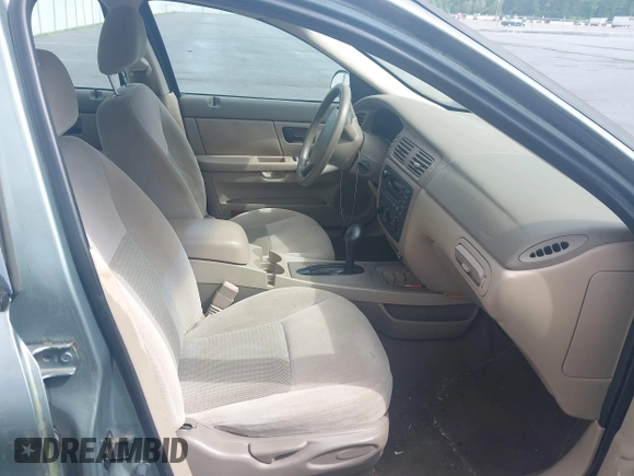 2005 Ford Taurus SE with VIN 1FAFP53U55A209369, listed as a IAAI auction lot 42144800 with 152,446 mi miles. Bid and sale history available at carsss.com. Image 5.